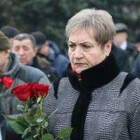 Учасники покладання квітів до пам’ятного знаку жертвам Чорнобильської трагедії