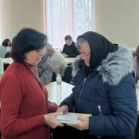 Вручення книги родинам загиблих захисників та захисниць